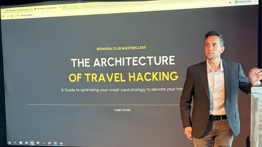 Gabe Douek presenting "The Architecture of Travel Hacking" at the Bermuda Club travel hacking masterclass in Carlsbad, CA